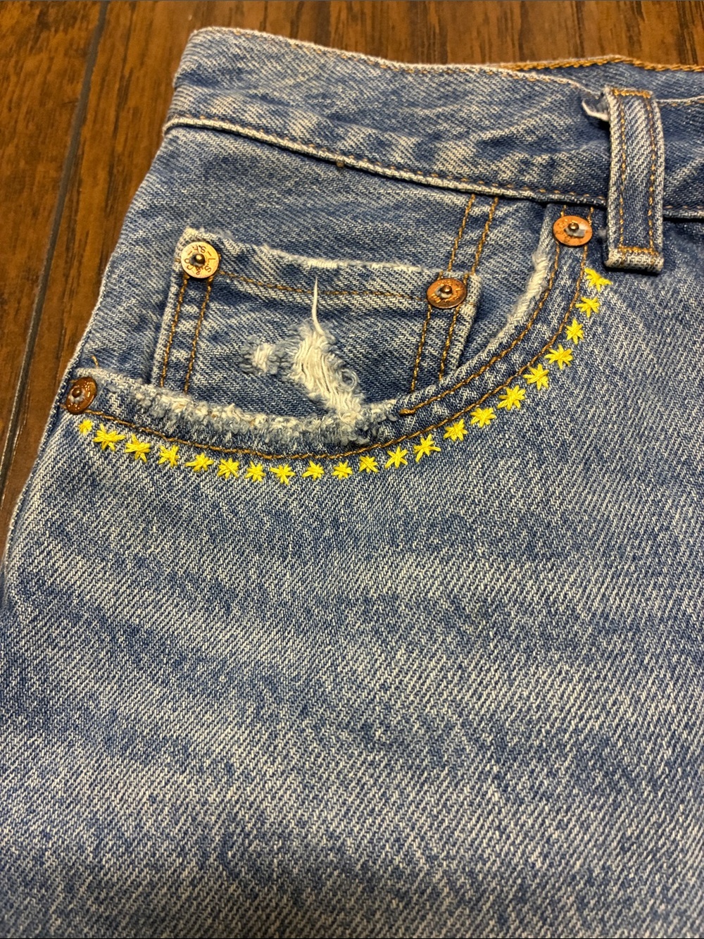 Levi's Light Blue Distressed Denim Mini Skirt with Yellow Stitching - Picture 2 of 5